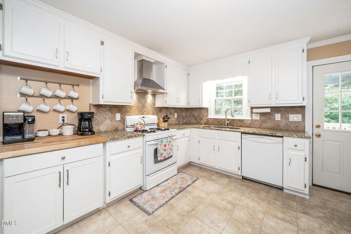 Property Photo:  102 Joel Court  NC 27513 