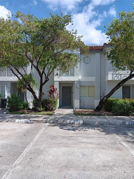 Property Photo:  20869 NW 2nd St 1  FL 33029 