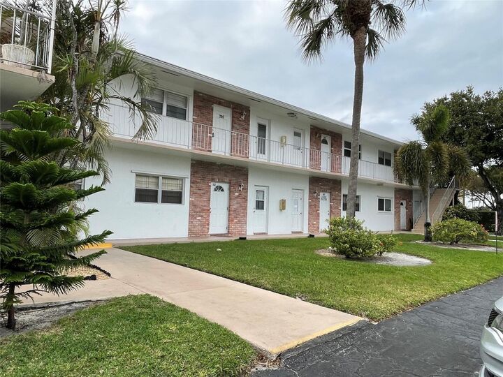 Property Photo:  2851 E Golf Boulevard 206  FL 33064 