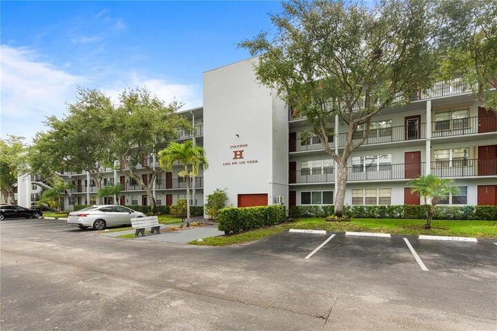 Property Photo:  1401 SW 135th Terrace 310H  FL 33027 