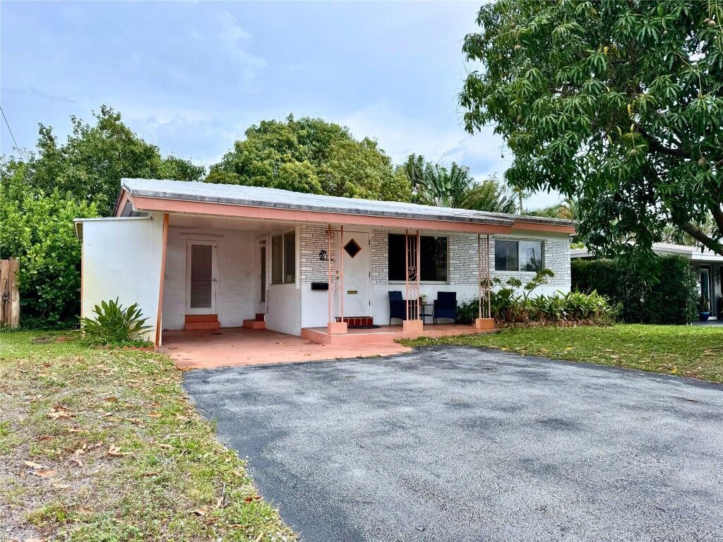 Property Photo:  311 NE 48th Court  FL 33334 