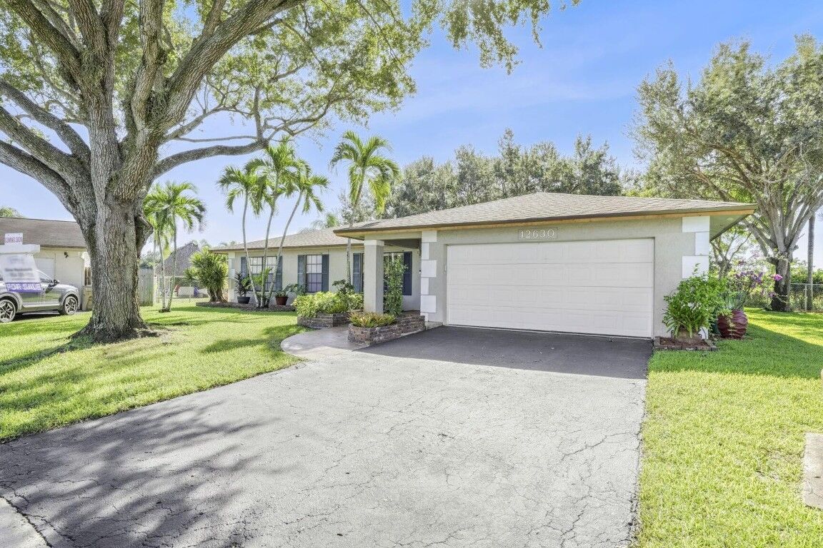Property Photo:  12630 SW 13th Manor  FL 33325 