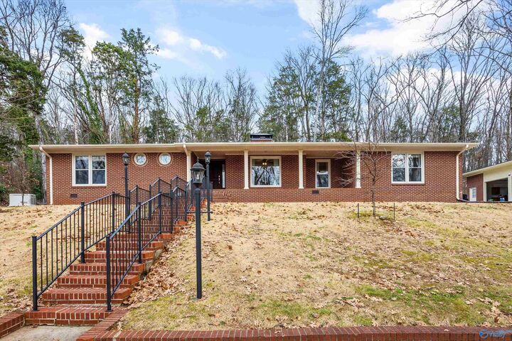 Property Photo:  409 Four Mile Post Road SE  AL 35802 