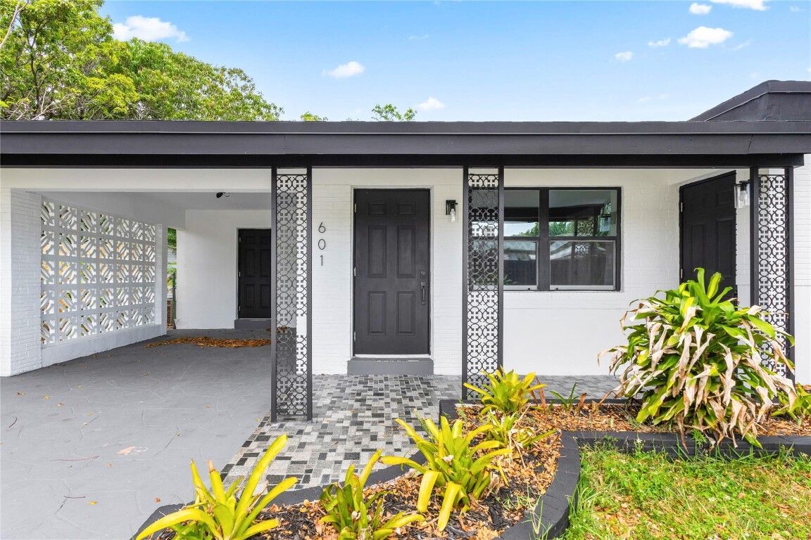 Property Photo:  601 NE 49th Street  FL 33334 