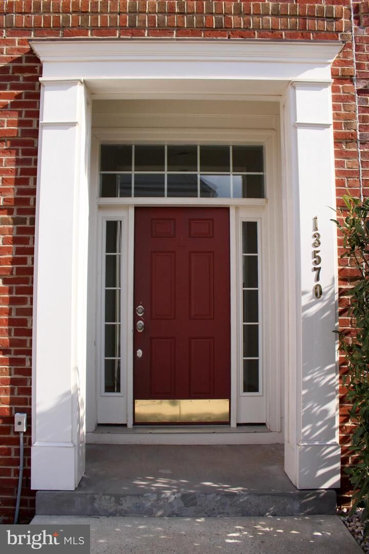 Property Photo:  13570 Village Green Drive  VA 20176 