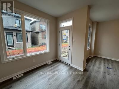 Property Photo:  386 Les Emmerson Drive  ON K2J 7L7 