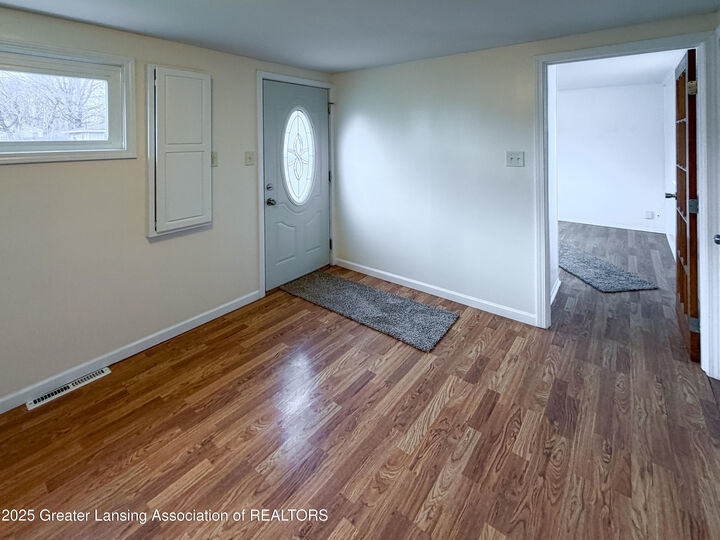 Property Photo:  226 W Jolly Road  MI 48910 