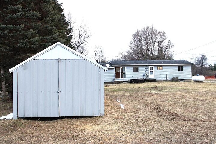 Property Photo:  8422 E M 20  MI 49421 