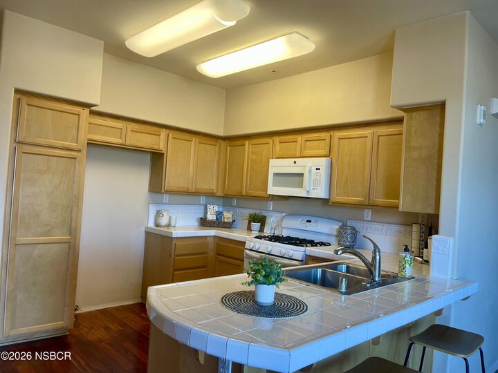 Property Photo:  310 E McCoy Lane 11F  CA 93455 