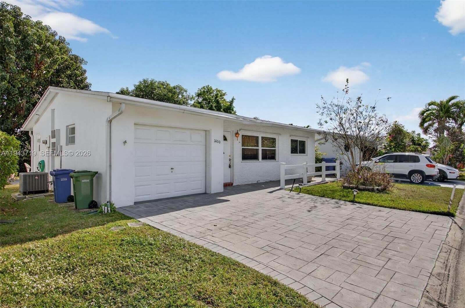 Property Photo:  1400 NW 69th Ave  FL 33063 