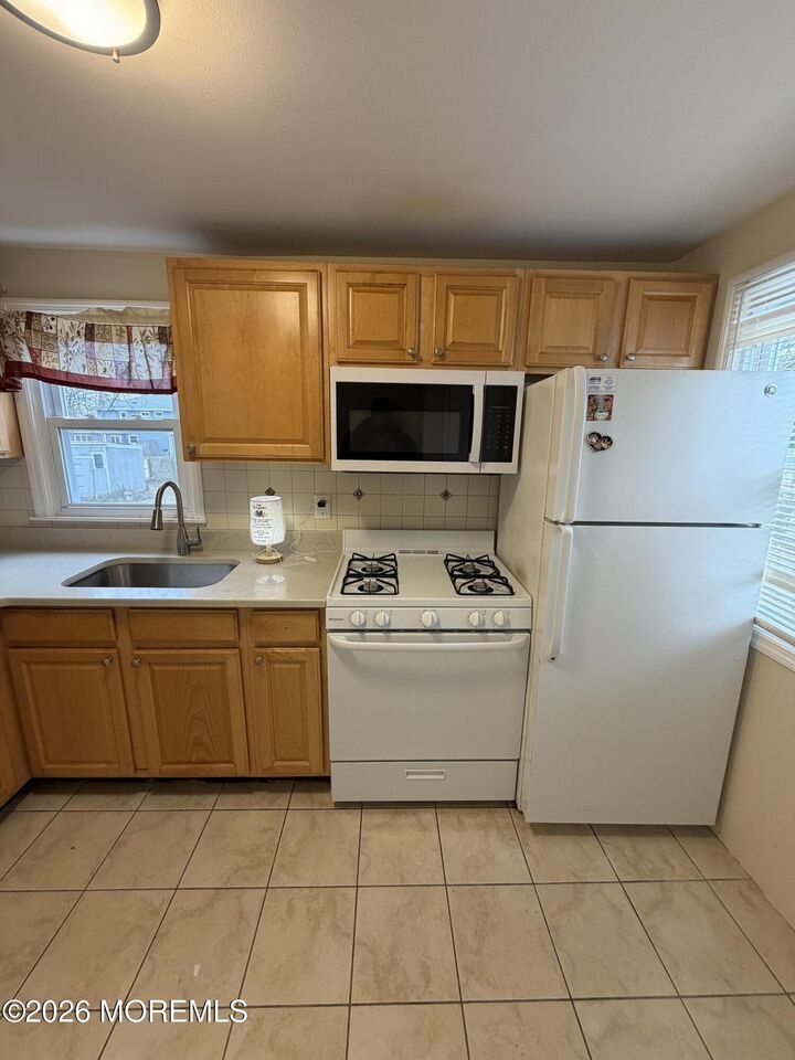 Property Photo:  2022 W Lake Avenue  NJ 07753 
