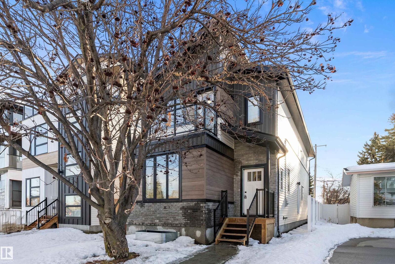 Property Photo:  7509 Rowland Road NW  AB T6A 3W4 