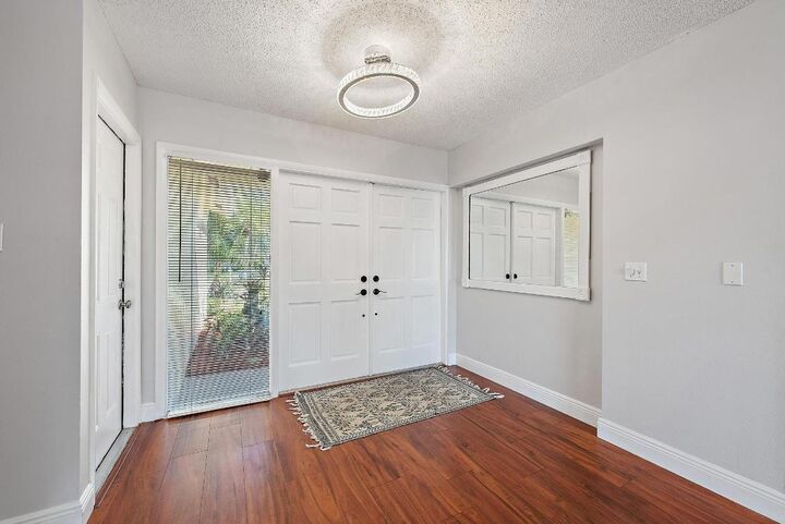 Property Photo:  1199 Jackpine Street  FL 33414 