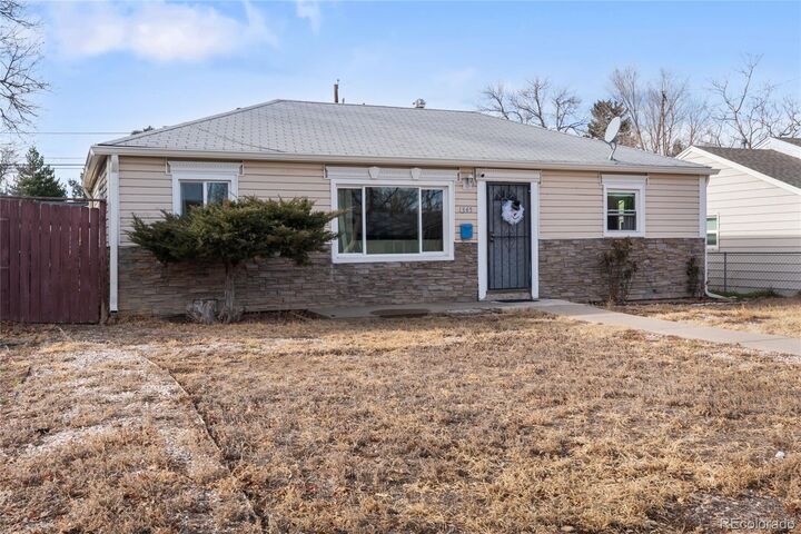 Property Photo:  1345 Dallas Street  CO 80010 