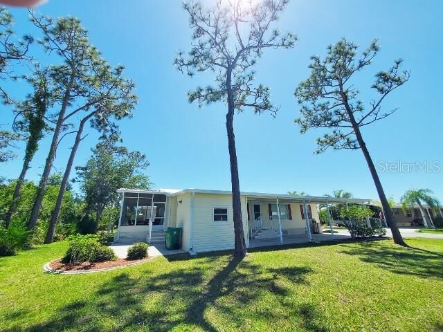 Property Photo: 29200 Jones Loop Road 125 FL 33950