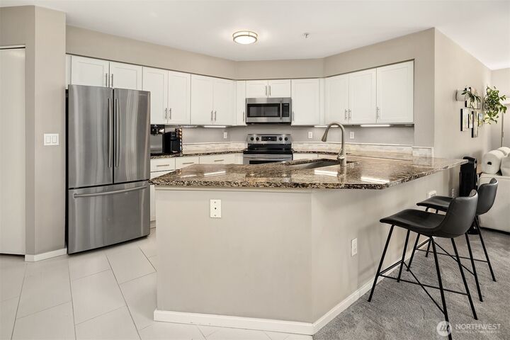 Property Photo:  8750  Greenwood Avenue N S208  WA 98103 