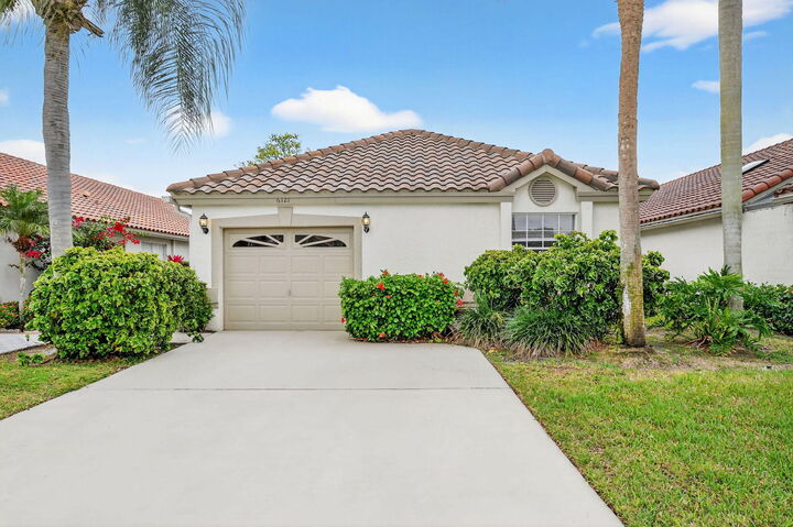 Property Photo:  6121 Bay Isles Drive  FL 33437 
