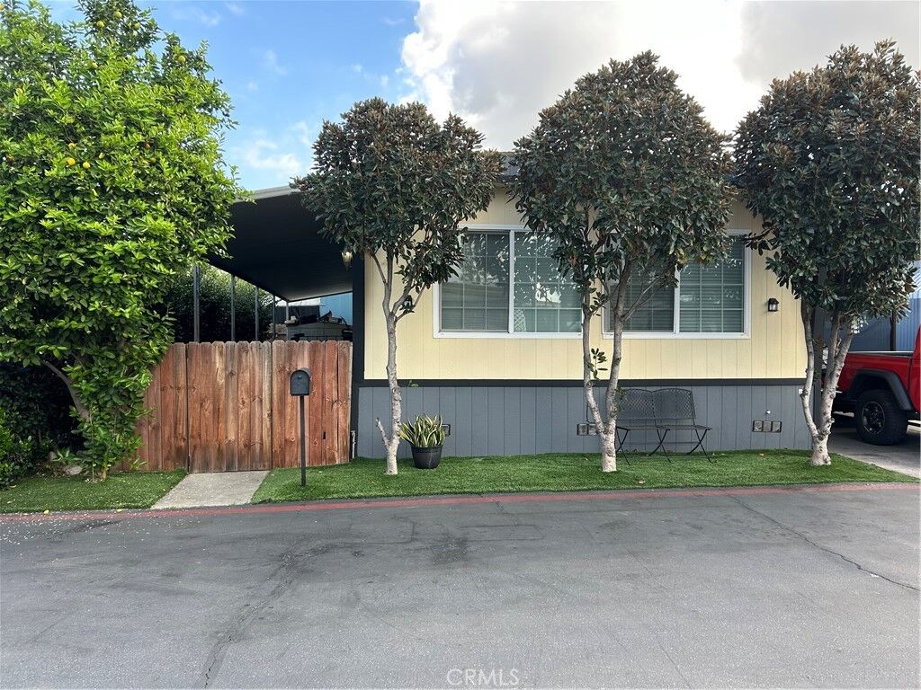 Property Photo:  16600 Orange Avenue 48  CA 90723 