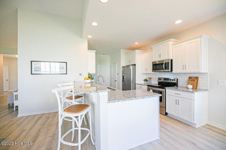 Property Photo:  205 S Bandwheel Way  NC 28443 