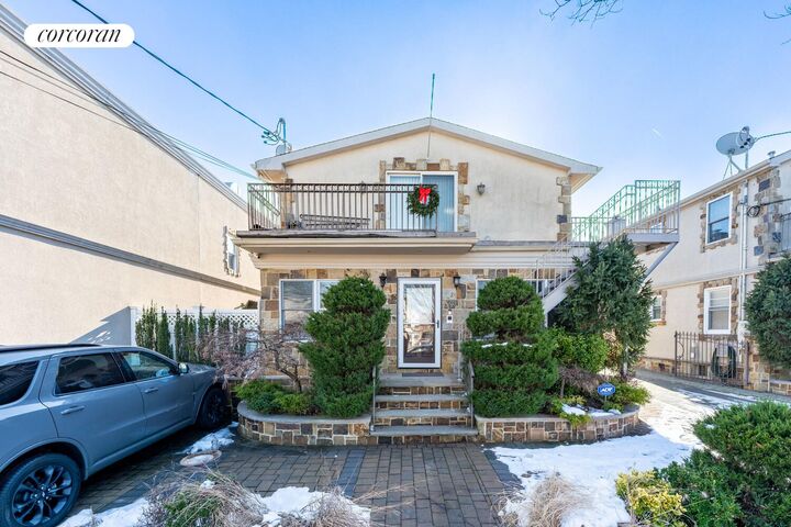 Property Photo:  162-12-20 77th Road  NY 11366 