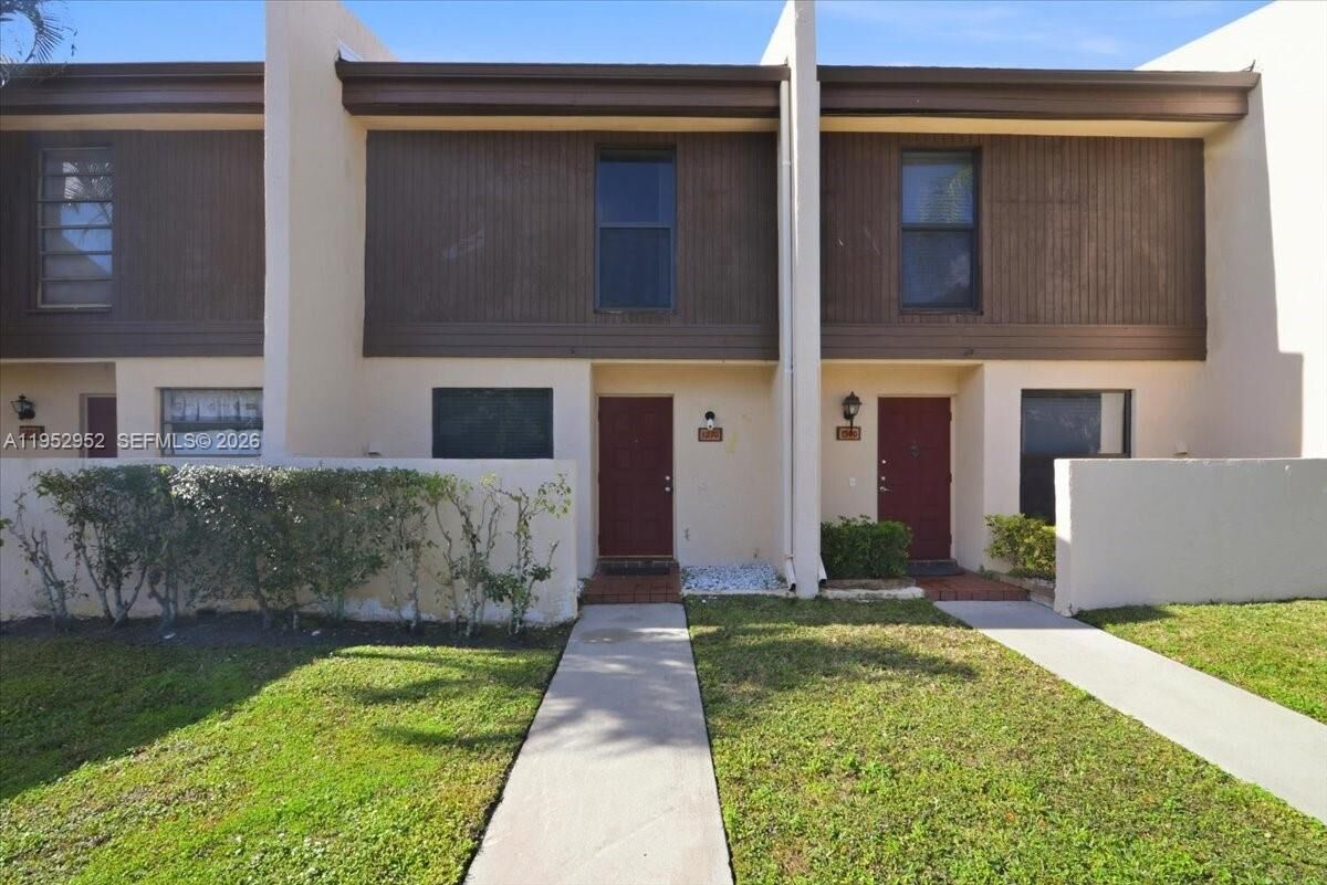 Property Photo:  1270 NW 99th Ave 60  FL 33024 
