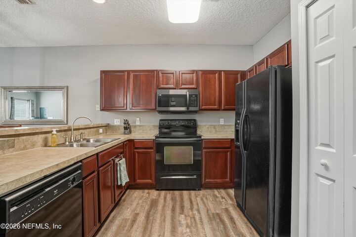 Property Photo:  9756 Summer Grove Way W 110  FL 32257 