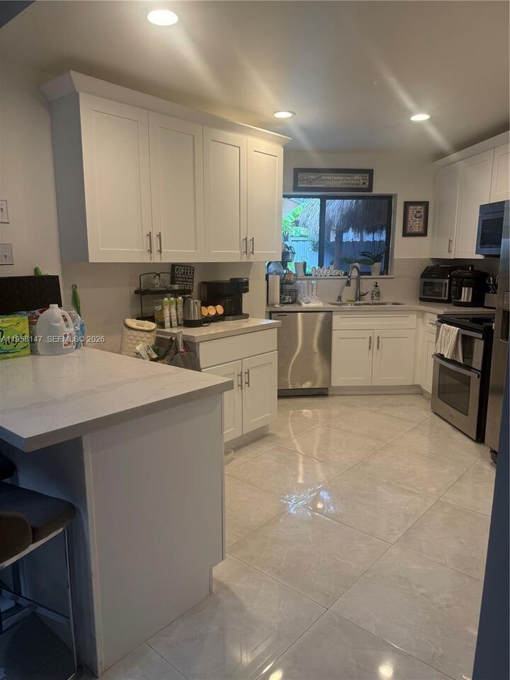 Property Photo:  11021 SW 13th St  FL 33025 