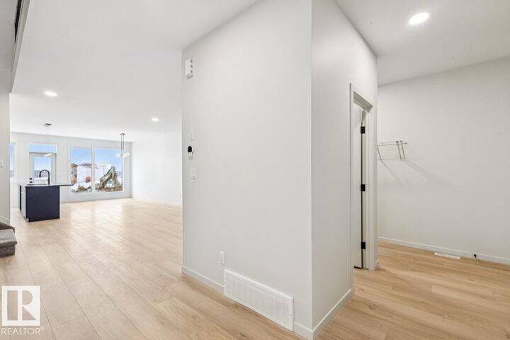 Property Photo:  7471 Klapstein Crescent SW  AB T6W 0A6 