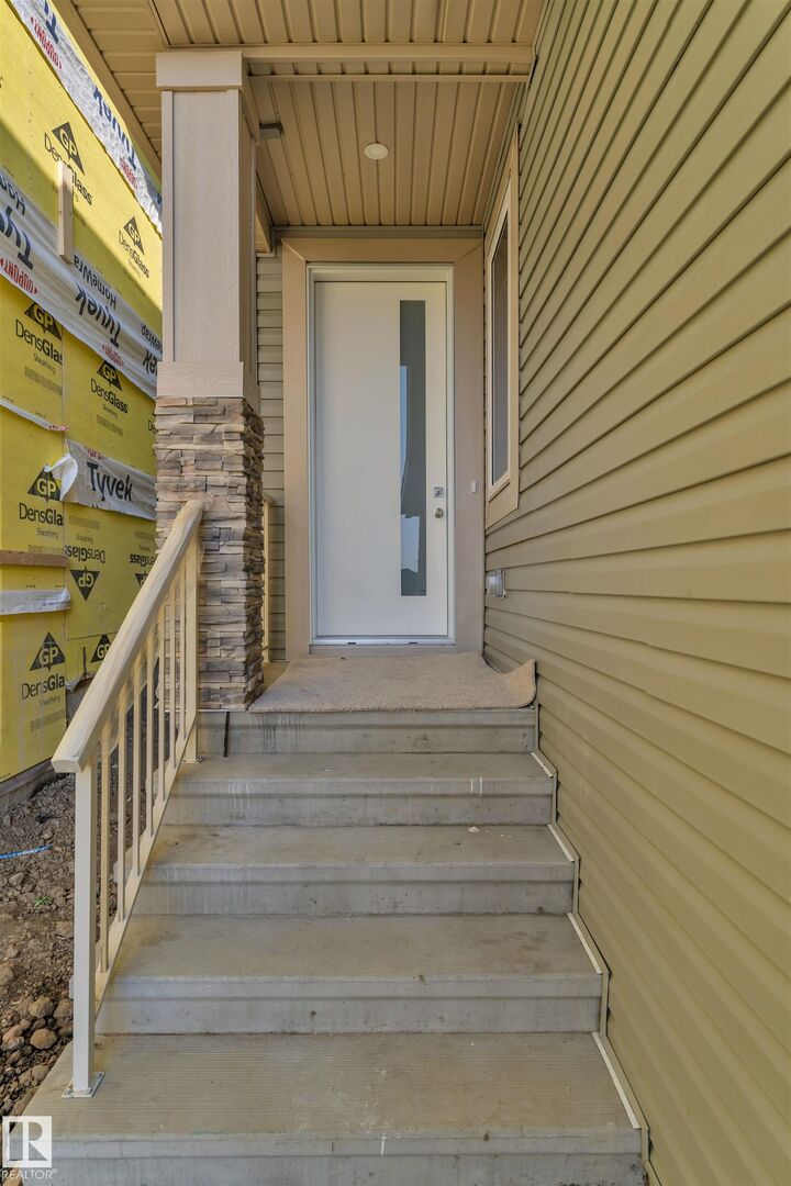 Property Photo: 4312 36 Street AB T4X 3G8