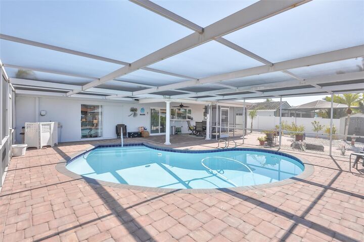 Property Photo:  6518 Senegal Palm Way  FL 33572 