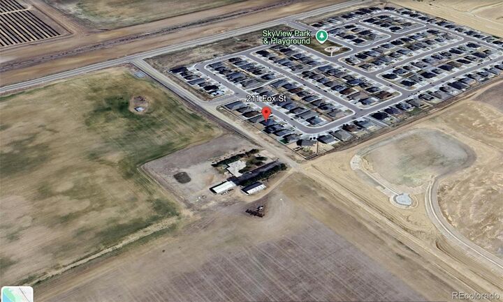 Property Photo:  211 Fox Street  CO 80102 