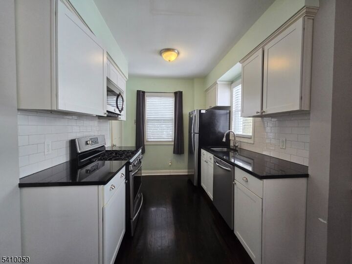 Property Photo:  48 Freeman Pl  NJ 07110 
