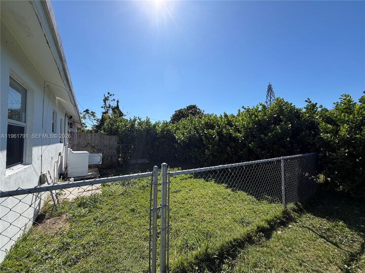 Property Photo:  11700 SW 221st St  FL 33170 
