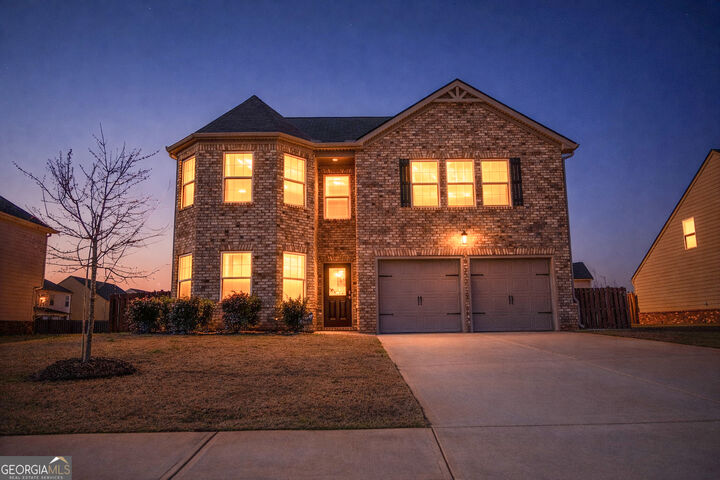 Property Photo: 909 Teabiscuit Way GA 30253