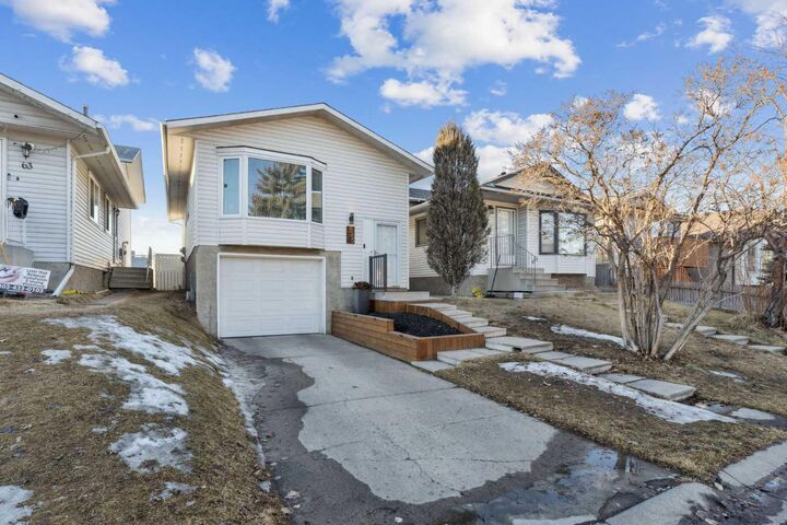 Property Photo: 65 Tararidge Close NE AB T3J 2P5