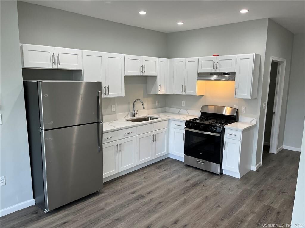 Property Photo:  893 Main Street 205  CT 06040 