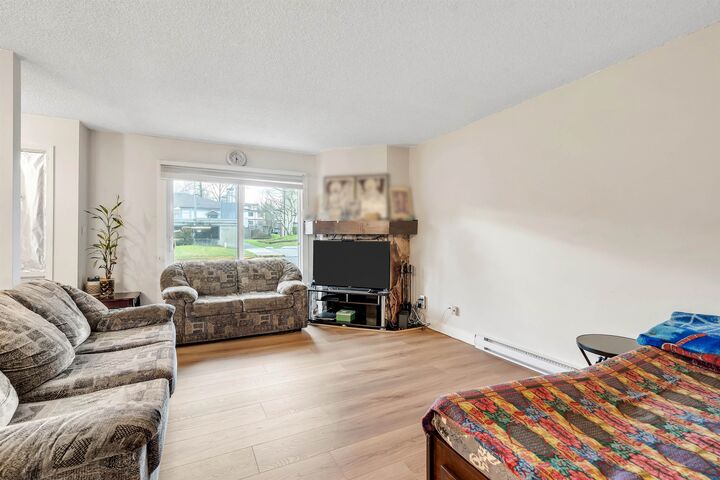 Property Photo: 7116 133B Street 105 BC V3W 8A4