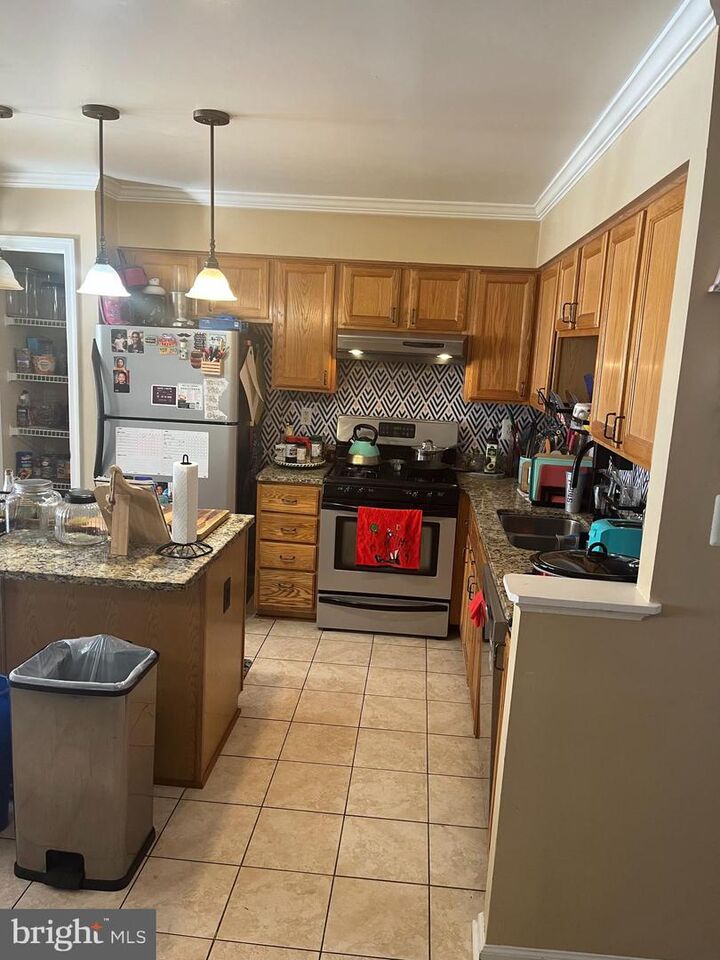 Property Photo:  12601 Town Center Way  MD 20772 