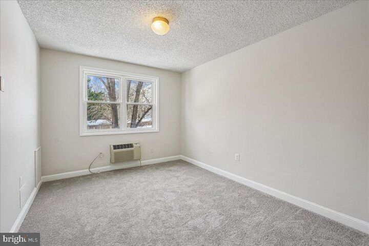 Property Photo:  7630 Tomlinson Avenue L-16  MD 20818 