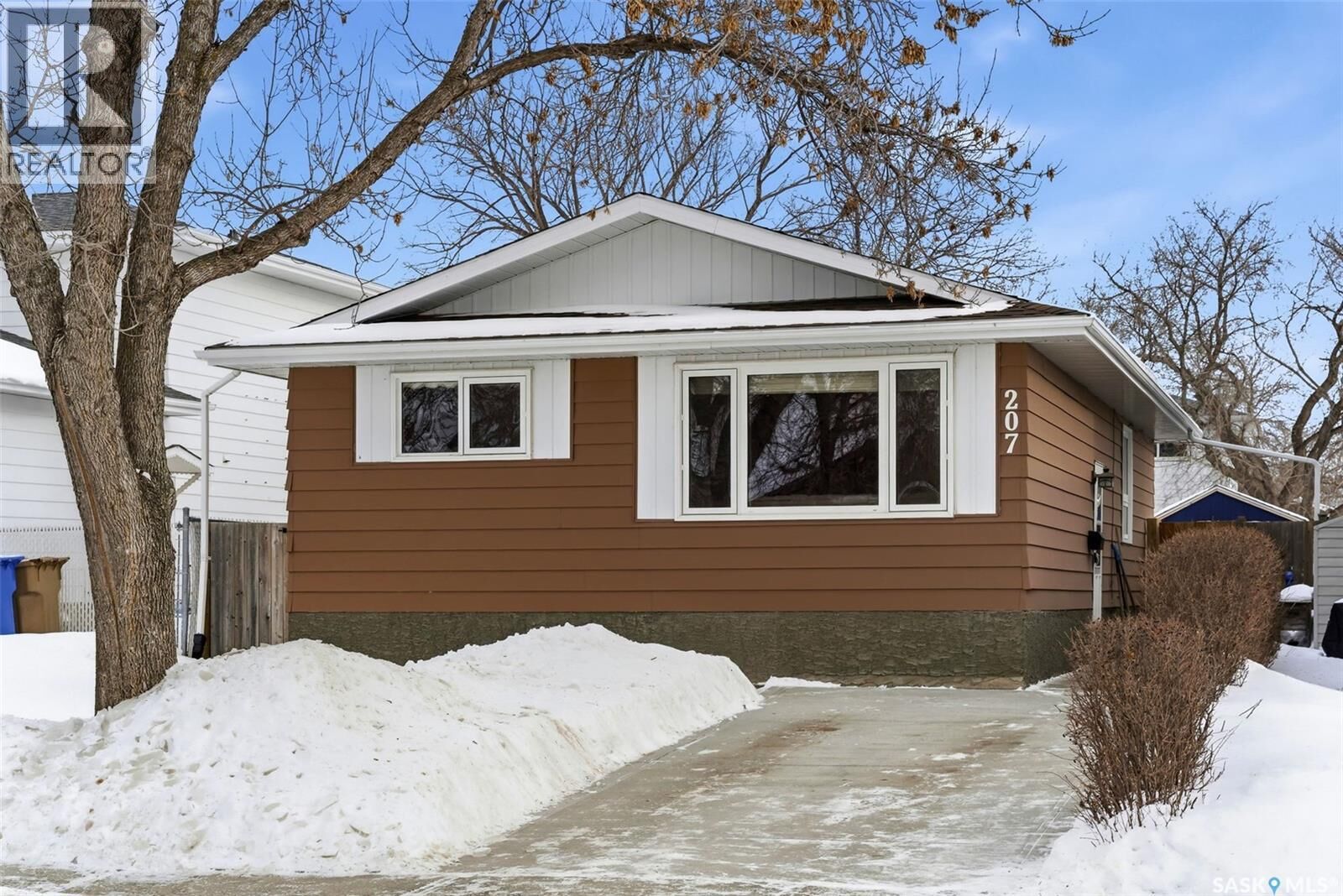 Property Photo:  207 Paynter Crescent  SK S4X 2A9 