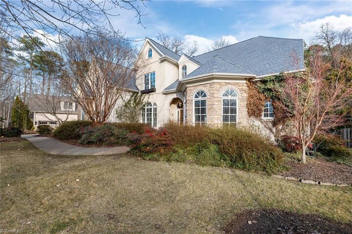 Property Photo:  900 Jefferson Wood Lane  NC 27410 