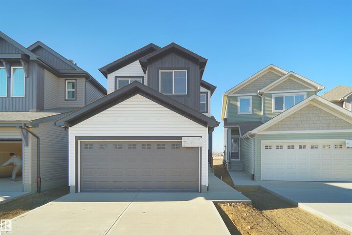 Property Photo: 2124 210 Street NW AB T6M 1P7