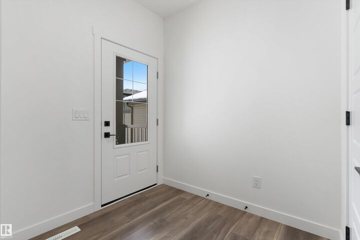 Property Photo: 4220 208 Street NW AB T6M 3E4