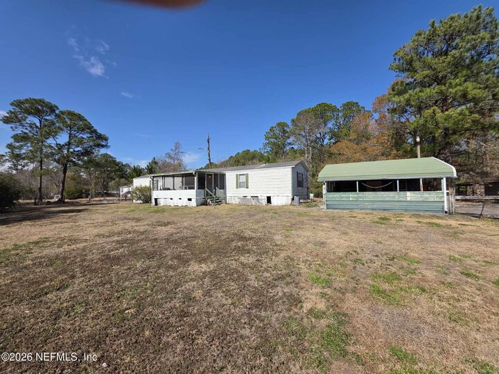 Property Photo: 16517 Village Green Drive N FL 32234