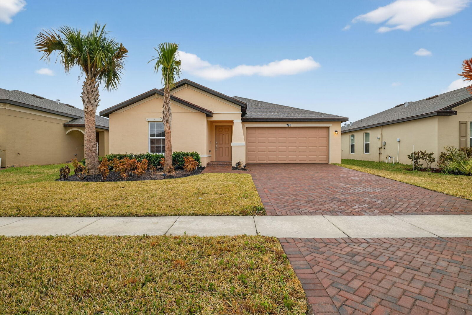 Property Photo:  748 Carlyle Way  FL 34947 