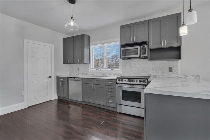 Property Photo:  27 Greenville Avenue  RI 02919 