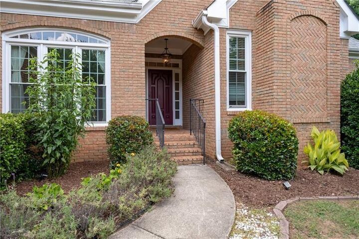 Property Photo: 10880 Windham Way GA 30022