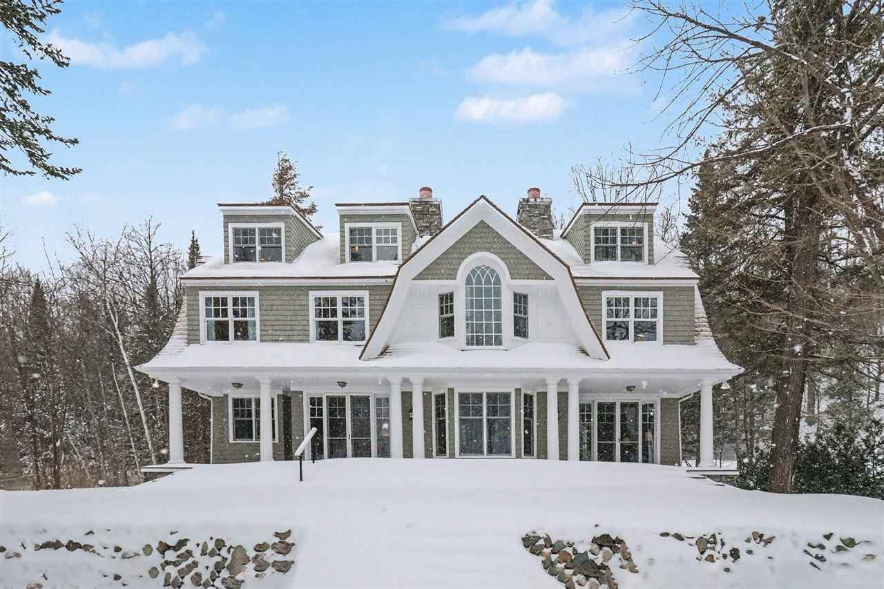 Property Photo:  5909 Cook Point Drive  MI 49740 