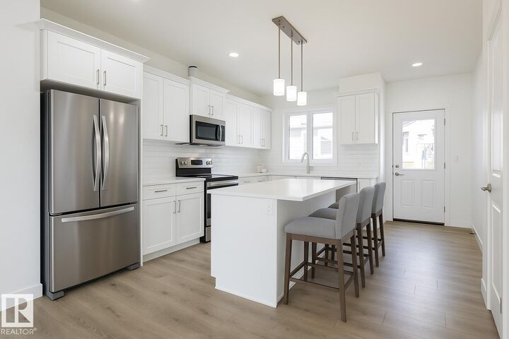 Property Photo: 1535 211 Street NW AB T6M 2M7