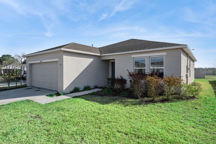 Property Photo:  33813 Sky Blossom Circle  FL 34788 